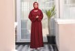 Girl is wearing Cherry maroon abaya dress