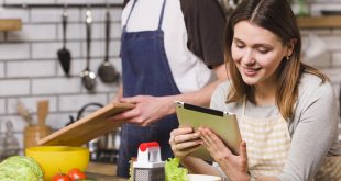 Student receiving cookery assignment help with a chef's hat and cooking tools.